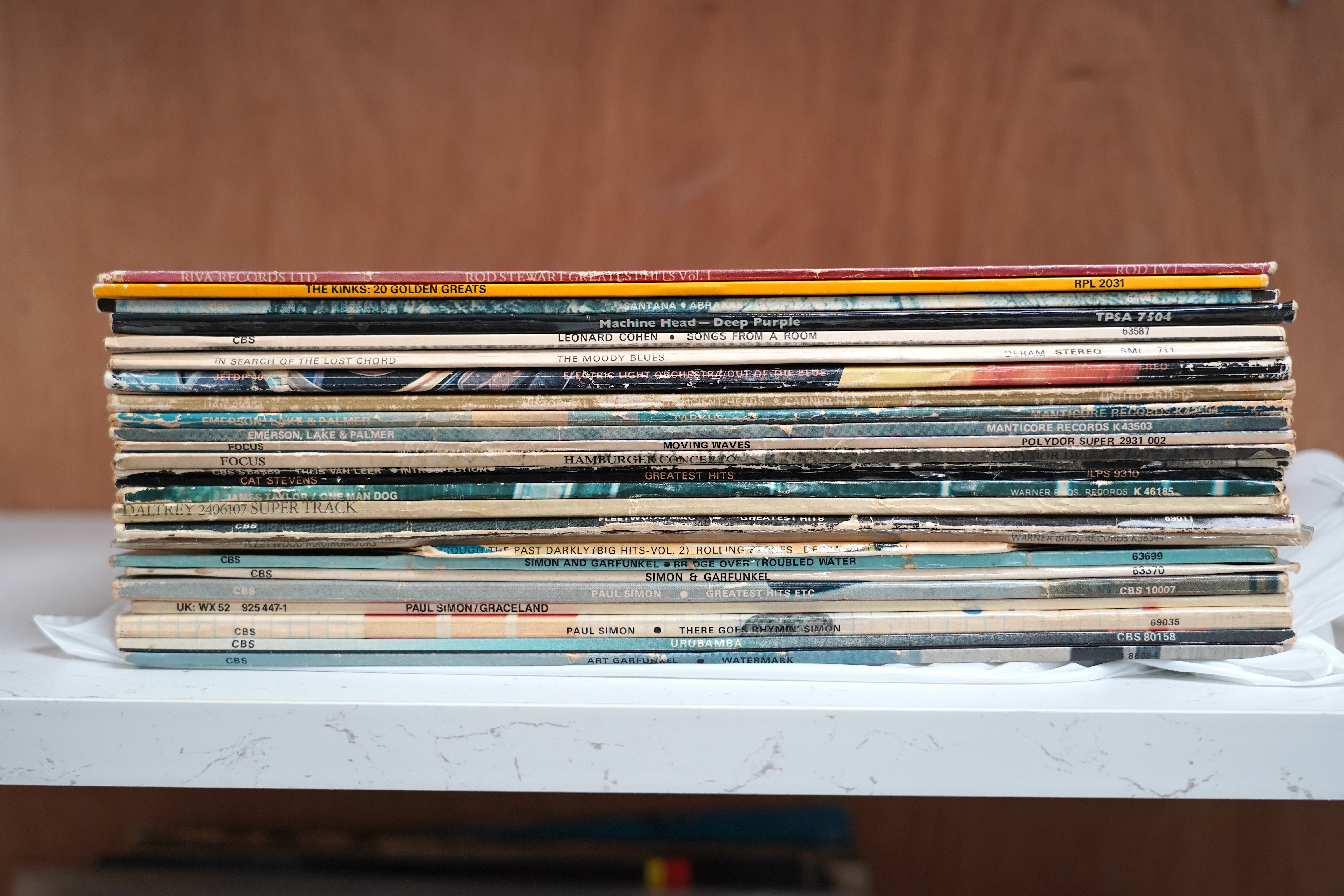 Twenty-six LP record albums, artists including; The Kinks, Rod Stewart, Deep Purple, Santana, Leonard Cohen, The Moody Blues, ELO, Focus, Fleetwood Mac, Rolling Stones, Simon and Garfunkel, etc.